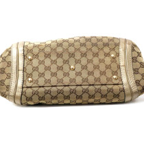 Gucci Bella GG e Pelle Dorata