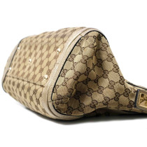 Gucci Bella GG e Pelle Dorata